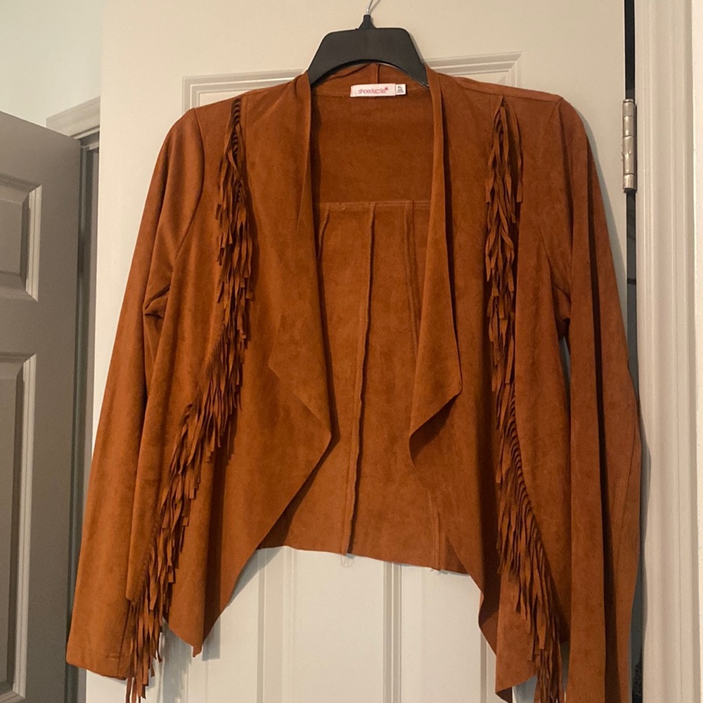 Rust suede cropped jacket.  Light weight.  I have never worn this jacket.